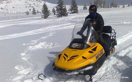 People on snowmobile tours in Borovets