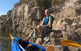 People on kayaking tours