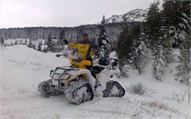 People participating in snowmobile adventures