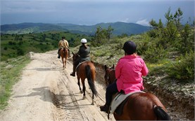 Riding above Dospat Lake